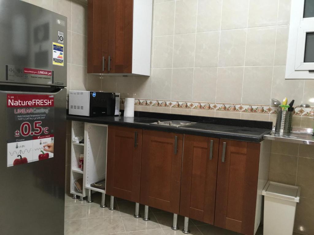 Kuchyň nebo kuchyňský kout v ubytování Al-Rehab luxury apartment Families only