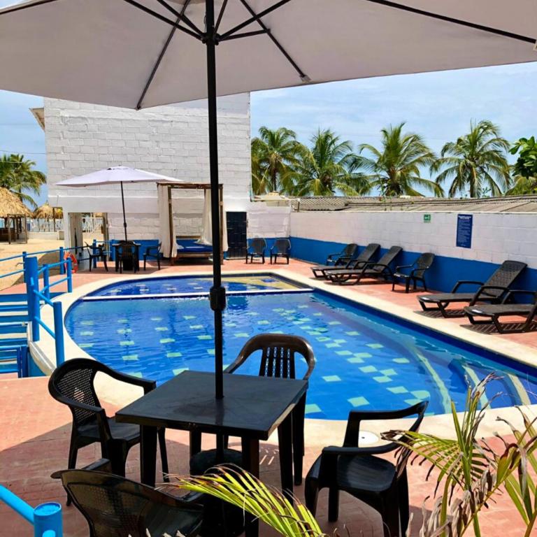 Φωτογραφία από το άλμπουμ του Cabañas Familiares en Coveñas con Piscina frente a la Playa σε Nicomar