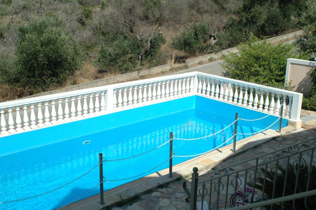 The swimming pool at or close to Irini's Villa
