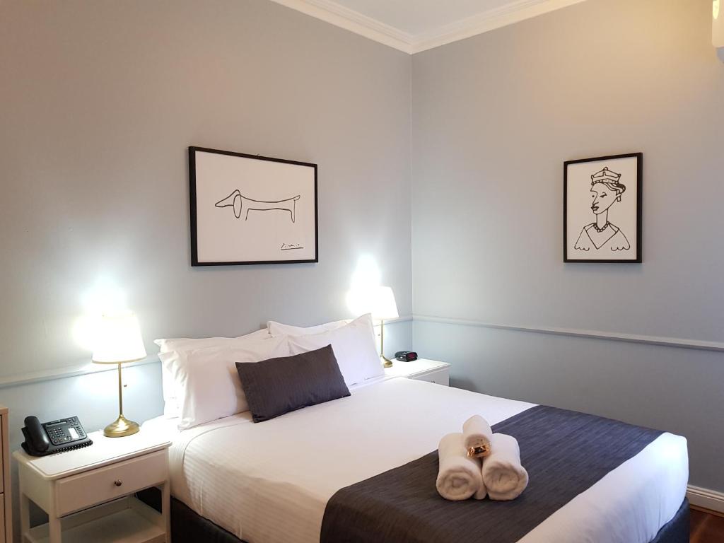 Postel nebo postele na pokoji v ubytování The Hughenden Boutique Hotel