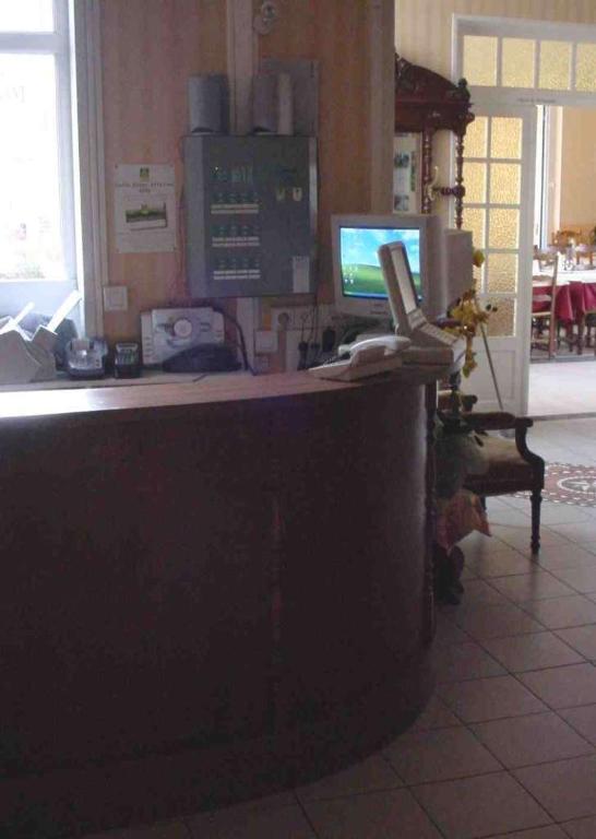 TV a/nebo společenská místnost v ubytování Le Clos Normand