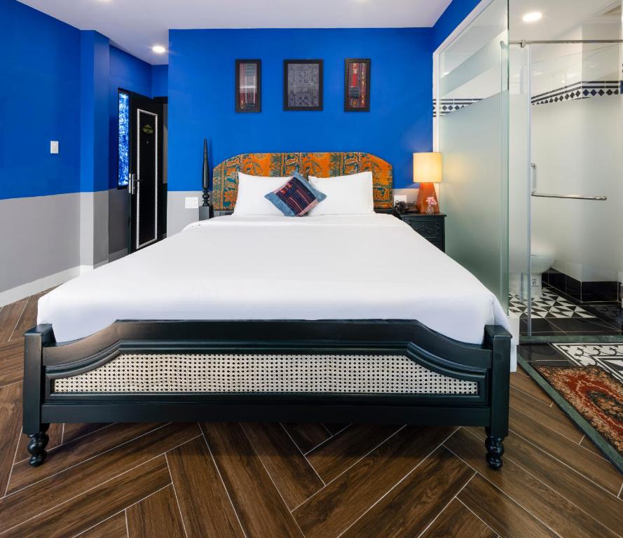 Giường trong phòng chung tại Heritage Boutique Sierra Legend