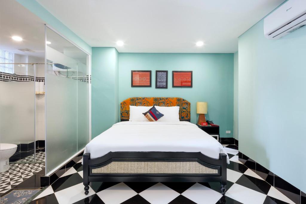 Giường trong phòng chung tại Heritage Boutique Sierra Legend