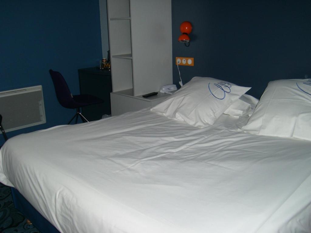 Postel nebo postele na pokoji v ubytování Hotel Gabriel