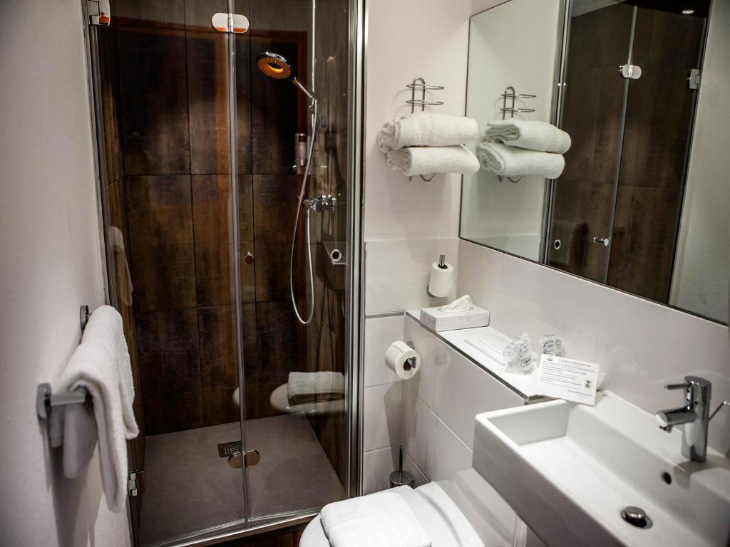 Koupelna v ubytování Hotel Gabriel