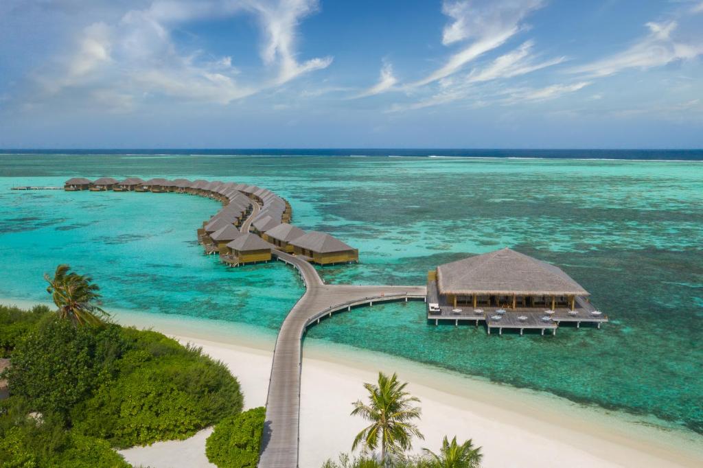 an aerial view of a resort on a beach at Cocoon Maldives - All Inclusive in Lhaviyani Atoll