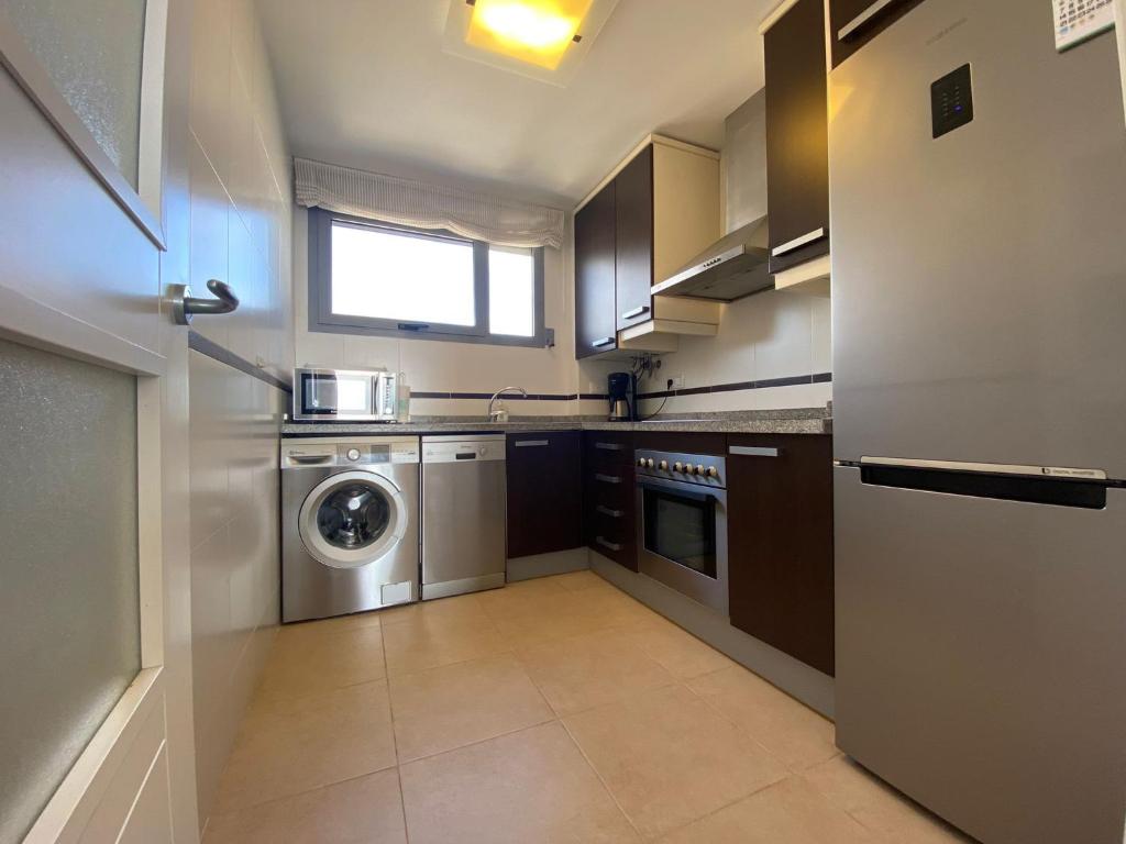 A kitchen or kitchenette at Plaza Mayor