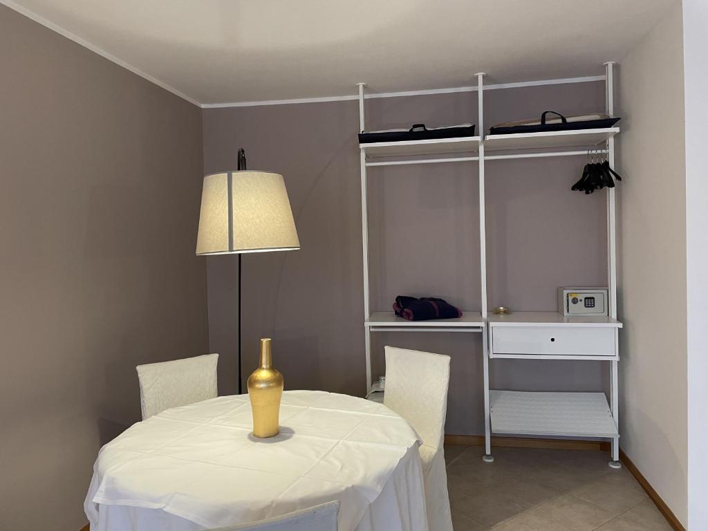 Postel nebo postele na pokoji v ubytování Hotel Petrarca