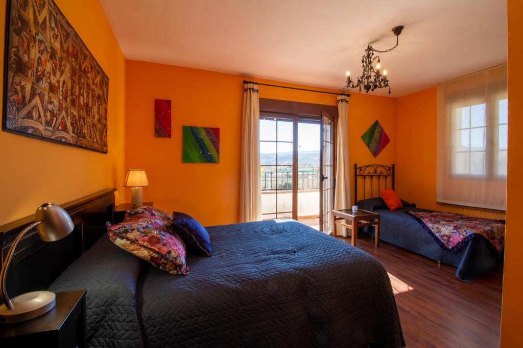 Postel nebo postele na pokoji v ubytování Casa La Villa