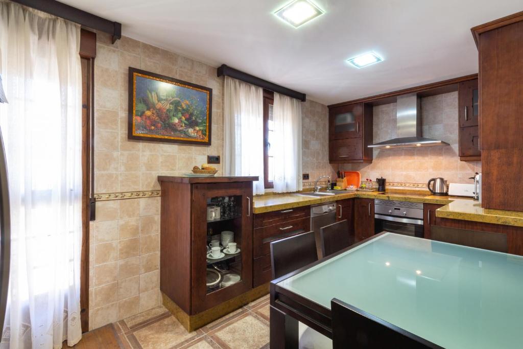 Kuchyň nebo kuchyňský kout v ubytování Casa La Villa