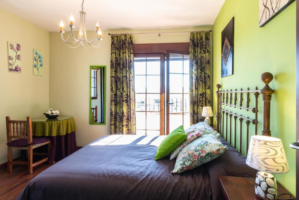 Postel nebo postele na pokoji v ubytování Casa La Villa