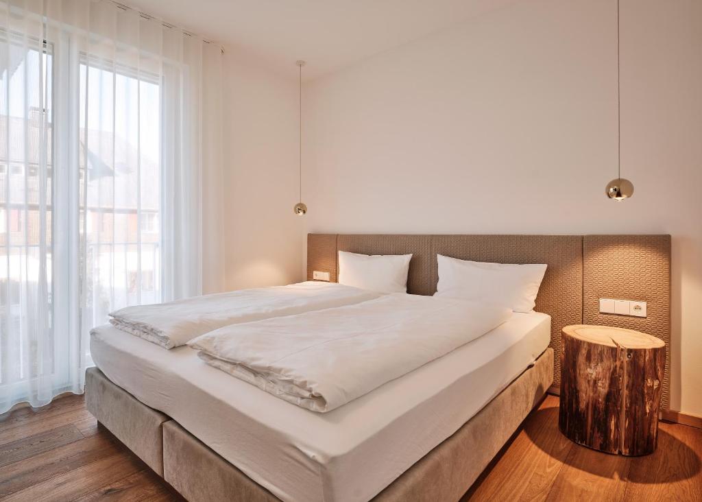 Postel nebo postele na pokoji v ubytování WaldFunkeln LODGE