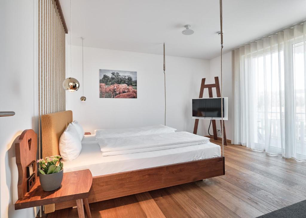 Postel nebo postele na pokoji v ubytování WaldFunkeln LODGE
