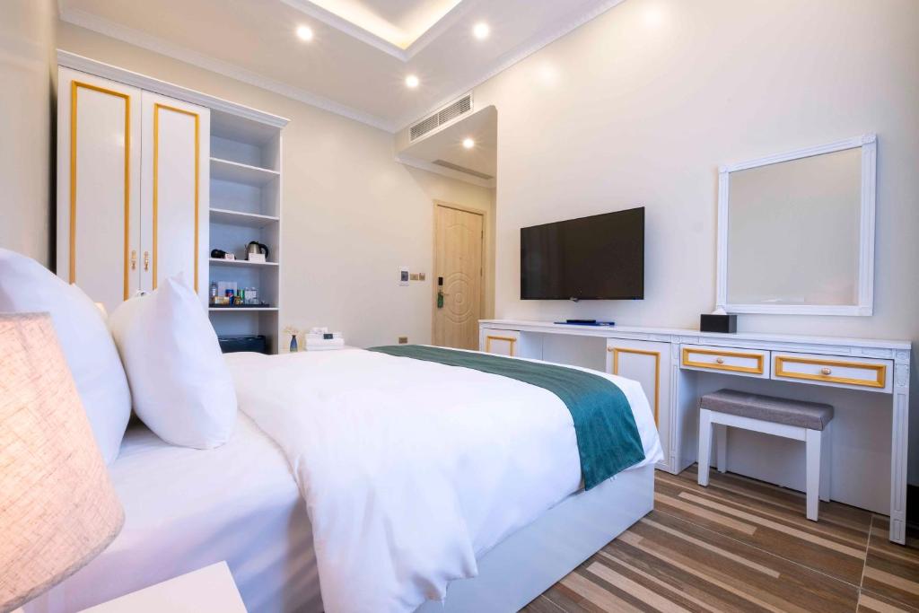 TV a/nebo společenská místnost v ubytování Minh Long Hotel