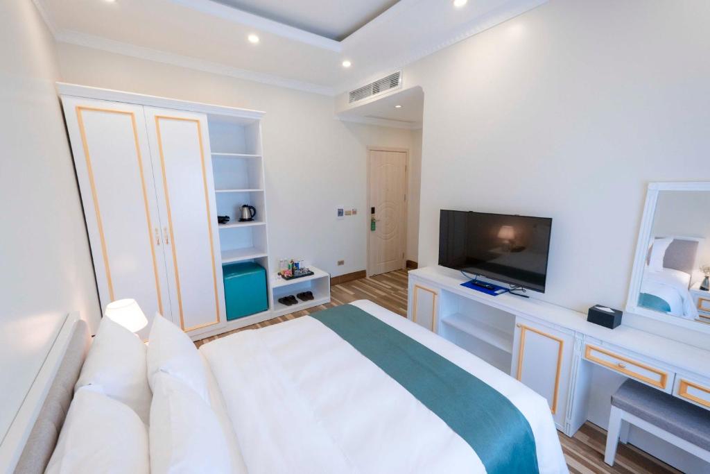 TV a/nebo společenská místnost v ubytování Minh Long Hotel