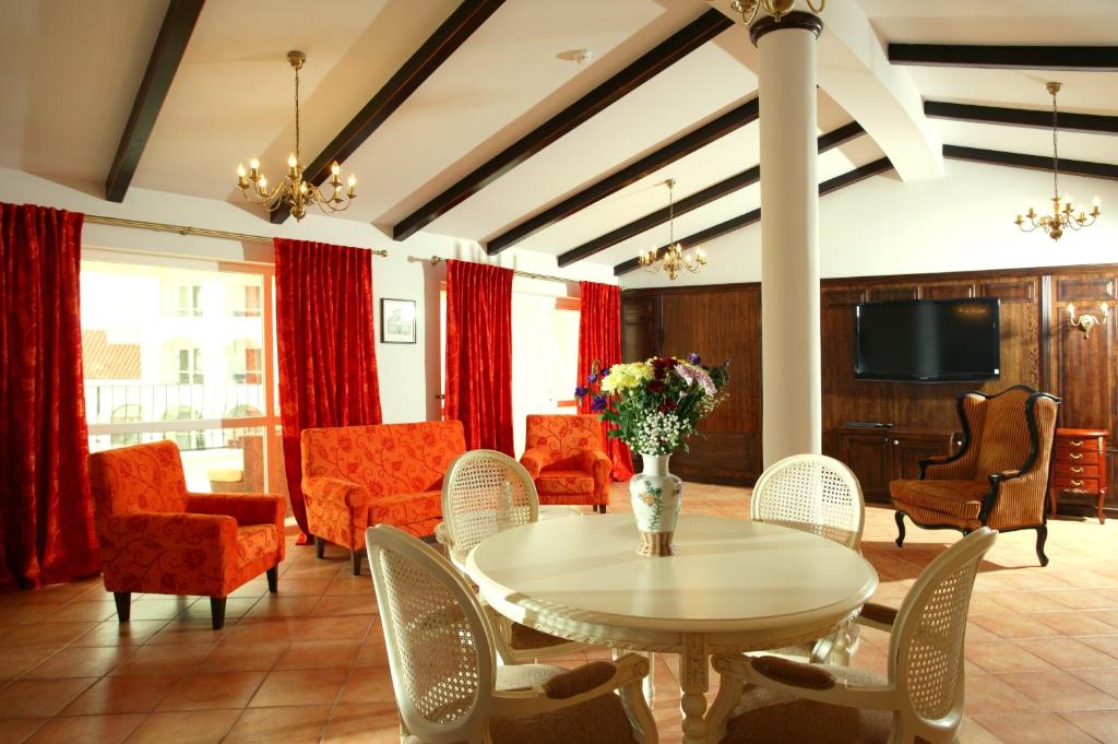 TV a/nebo společenská místnost v ubytování Arena Regia Hotel & Spa - Marina Regia Residence