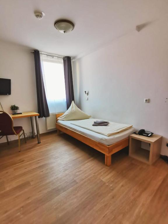 Postel nebo postele na pokoji v ubytování A.B. Hotel