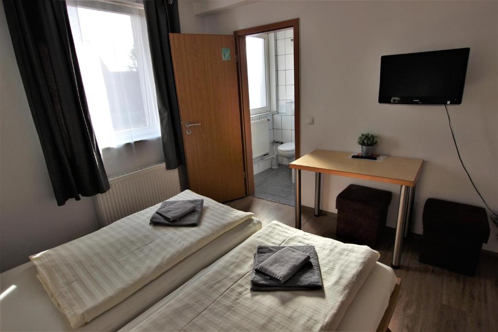 Postel nebo postele na pokoji v ubytování A.B. Hotel