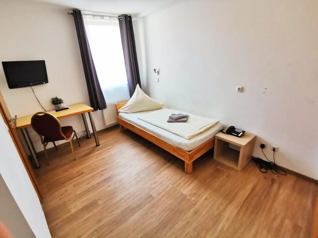 Postel nebo postele na pokoji v ubytování A.B. Hotel
