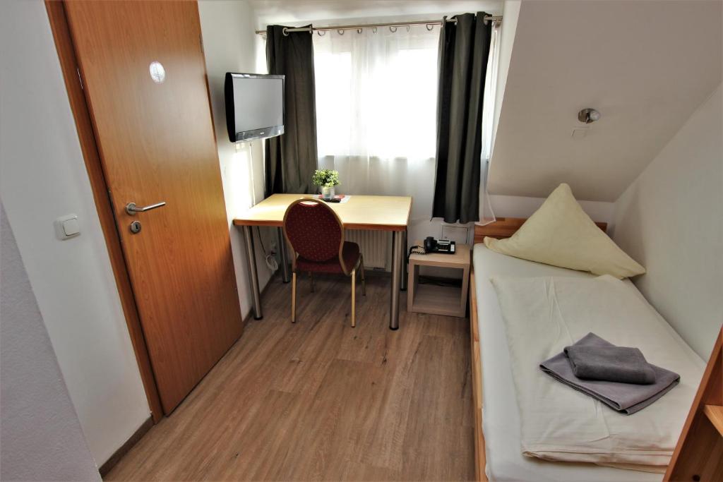 Postel nebo postele na pokoji v ubytování A.B. Hotel
