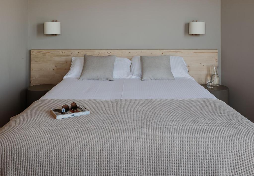 Postel nebo postele na pokoji v ubytování Hotel Llane Petit