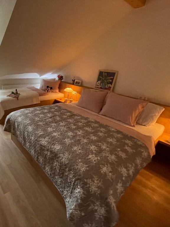 Postel nebo postele na pokoji v ubytování Apartmány Bašta & Wellness