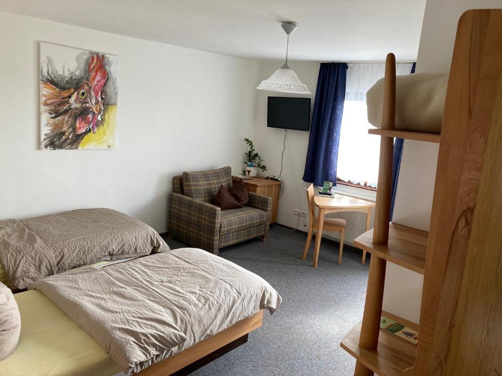 Postel nebo postele na pokoji v ubytování Hotel-Pension- Vesperstube Waldblick