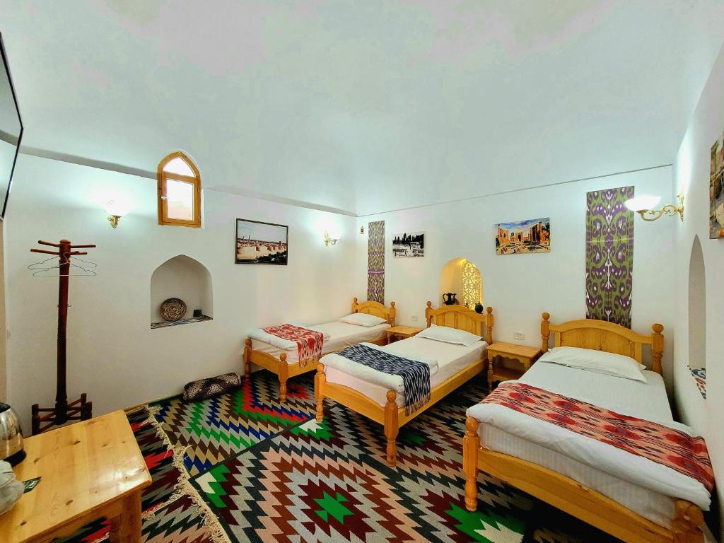 madrasah Polvon-Qori boutique hotel XIX century - Habitación Triple Estándar