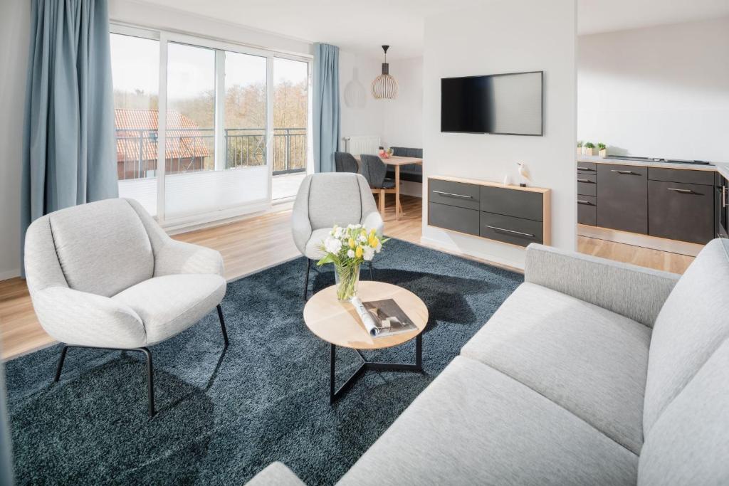 TV a/nebo společenská místnost v ubytování Apartmenthaus B3