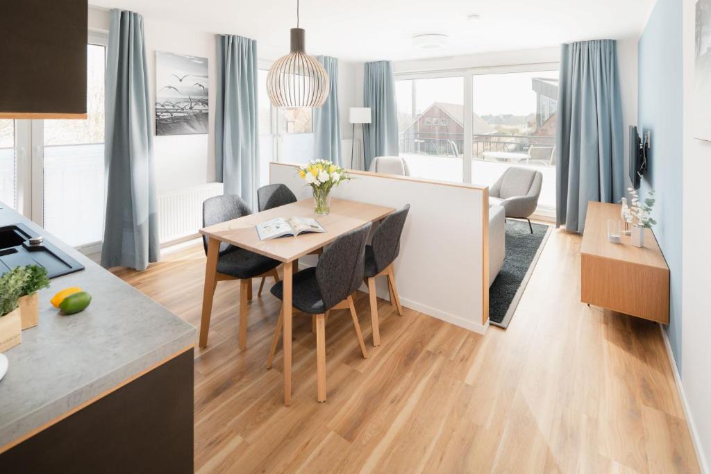 TV a/nebo společenská místnost v ubytování Apartmenthaus B3
