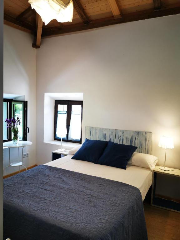 Cama o camas de una habitación en Huerto San Antonio