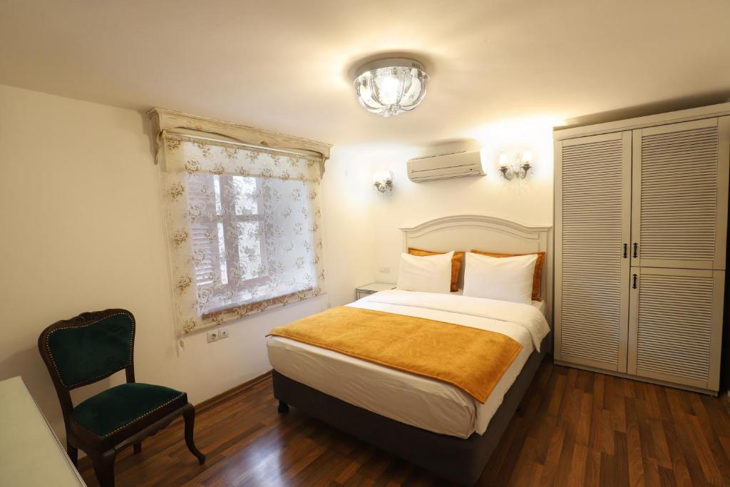 Postel nebo postele na pokoji v ubytování White Garden Hotel-Adult Only