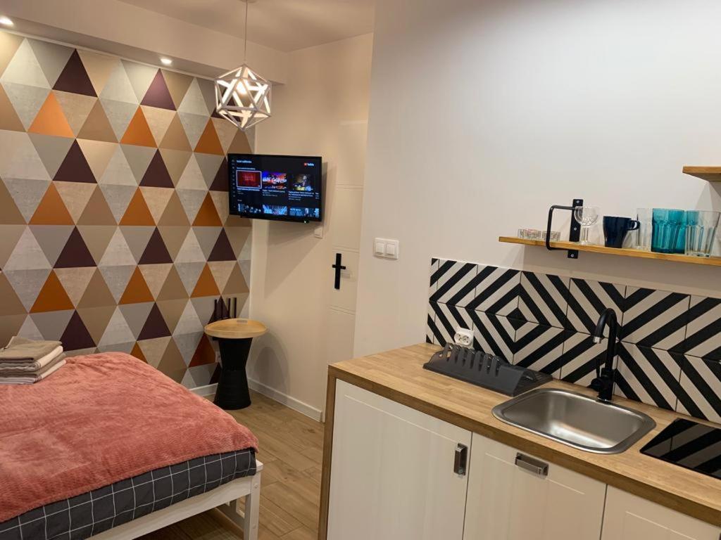 Posteľ alebo postele v izbe v ubytovaní APARTAMENT WILEŃSKA #free parking, self check-in