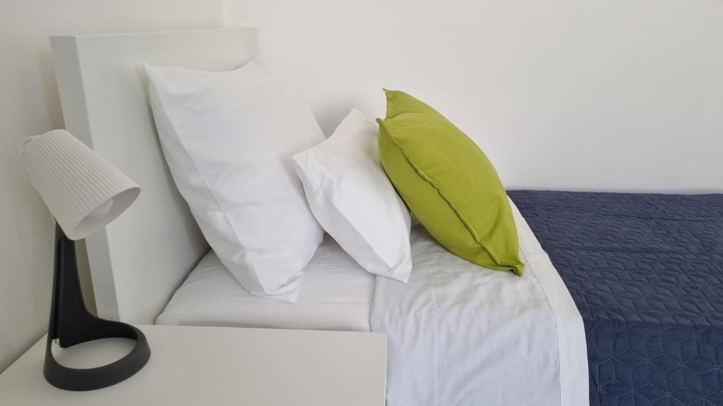 Postel nebo postele na pokoji v ubytování Simuni Delight