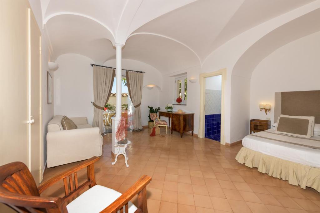 Postel nebo postele na pokoji v ubytování Hotel L'Ancora