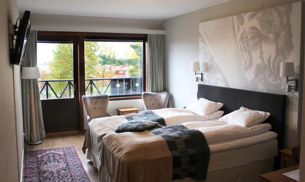 Postel nebo postele na pokoji v ubytování Green Hotel