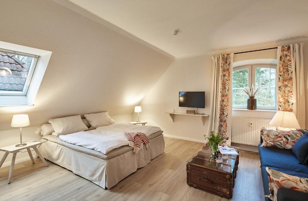 Postel nebo postele na pokoji v ubytování Gut Hohenstein - Platanenappartment