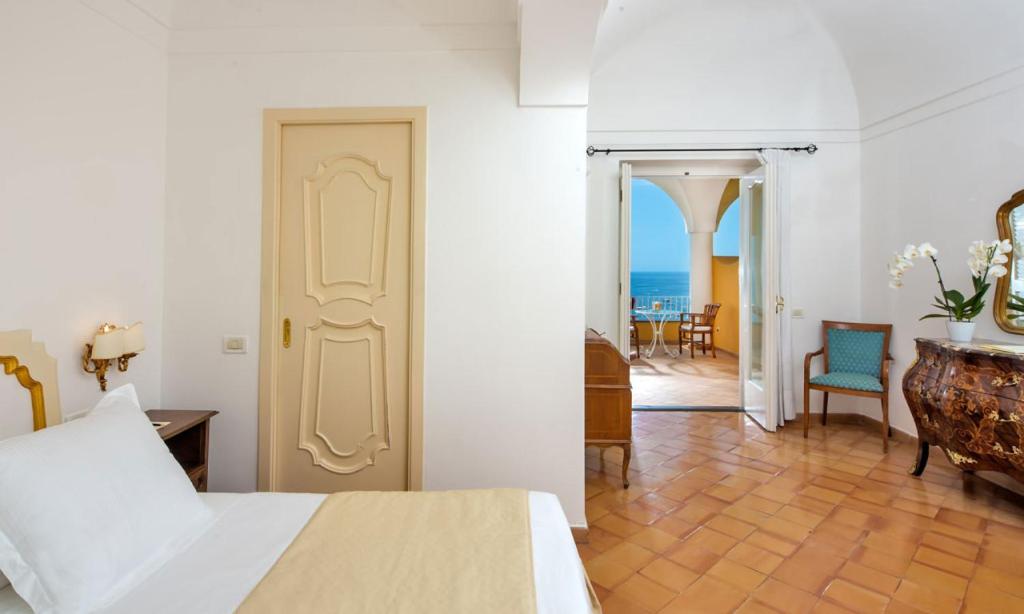 Postel nebo postele na pokoji v ubytování Hotel L'Ancora