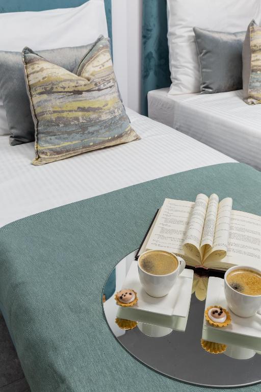 Posteľ alebo postele v izbe v ubytovaní Family Center Apartments