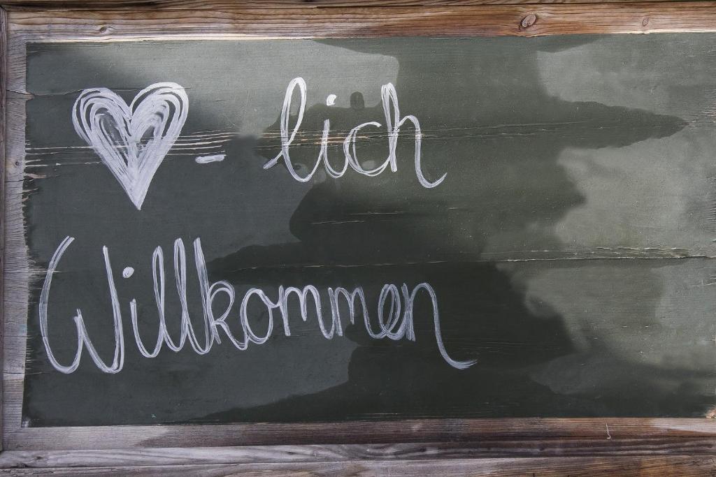 a chalkboard with a sign that says high california at Gästehaus beim Metzger / Döttingen am Nürburgring in Döttingen