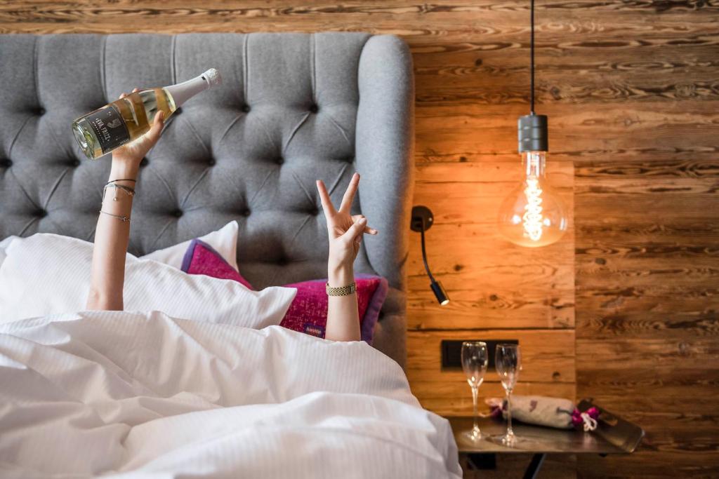 A bed or beds in a room at eva,VILLAGE