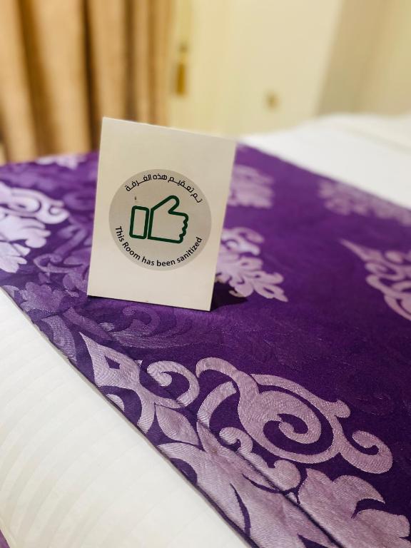 Postel nebo postele na pokoji v ubytování Tourist Hotel