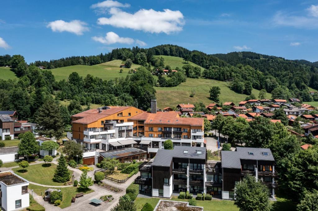 an aerial view of a residential estate in the mountains at Karma Bavaria in Schliersee