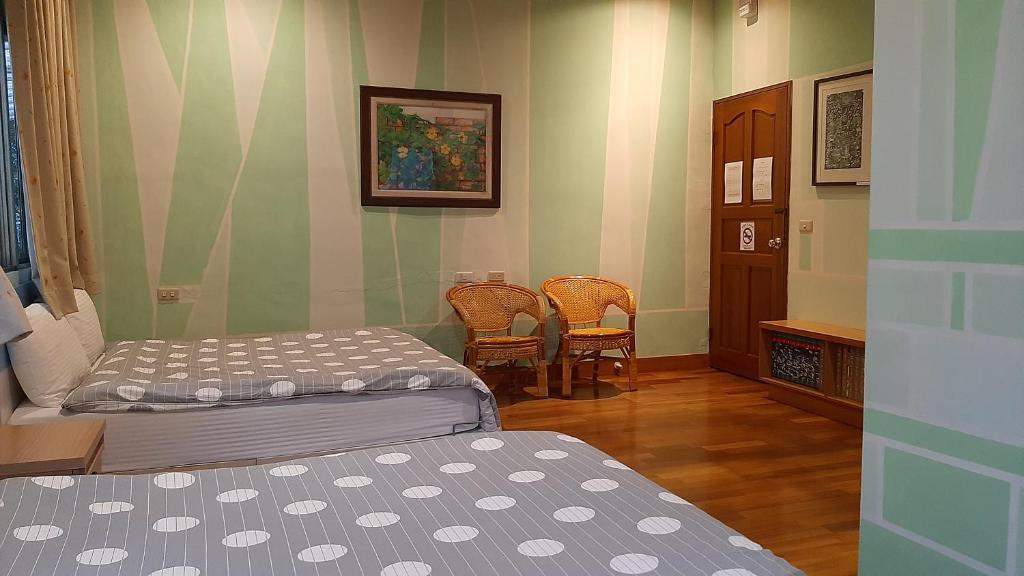 Postel nebo postele na pokoji v ubytování Erfen De Homestay