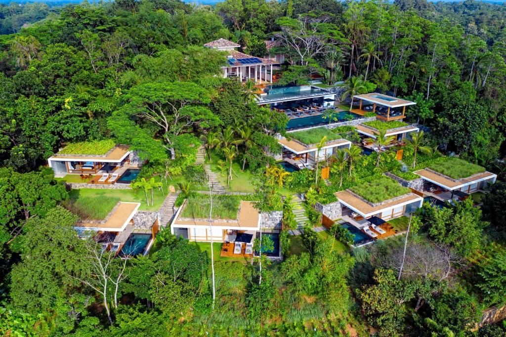 an aerial view of a house in the forest at Haritha Villas & Spa in Hikkaduwa