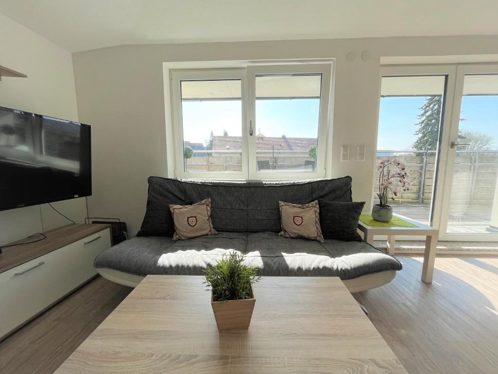 TV a/nebo společenská místnost v ubytování 7980 SunHill Apartementwohnung