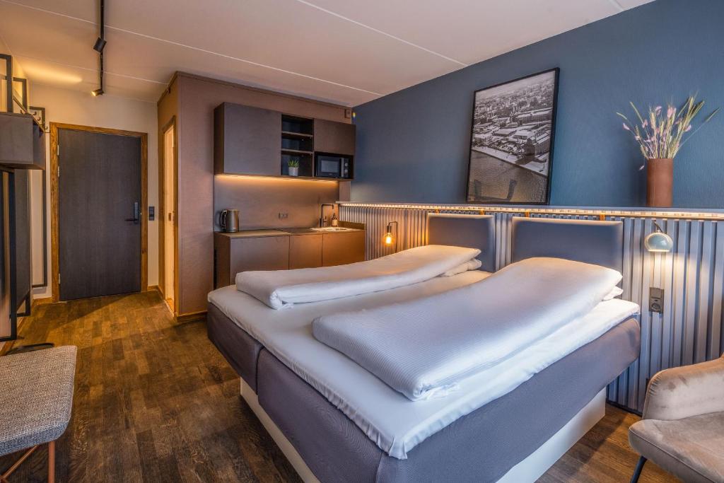 Postel nebo postele na pokoji v ubytování Pier 5 Hotel