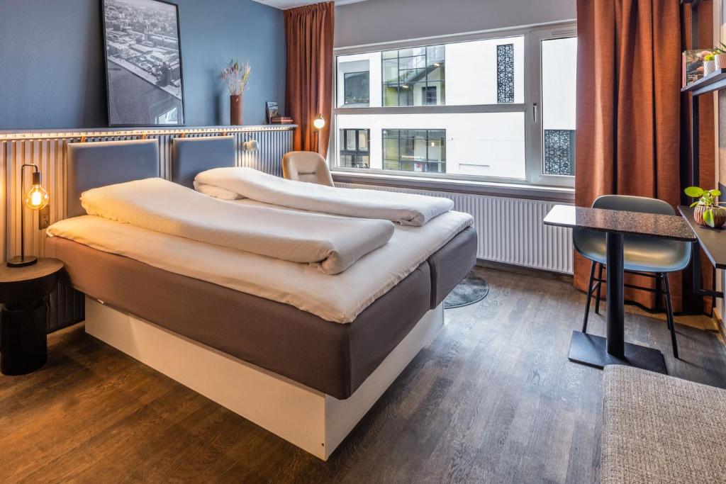 Postel nebo postele na pokoji v ubytování Pier 5 Hotel