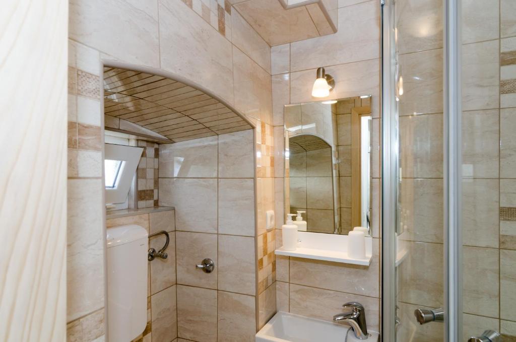 Kúpeľňa v ubytovaní Apartment and Room Kapelica