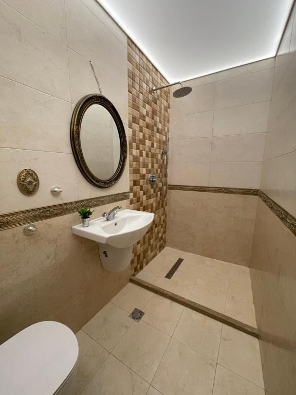 A bathroom at Guest House Amore